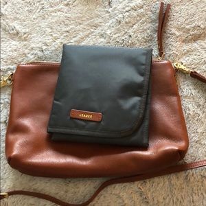 Leader leather crossbody changing bag. New!